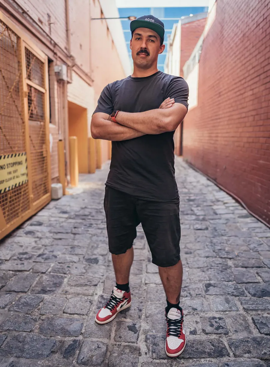Sev Mozhaev standing in a laneway